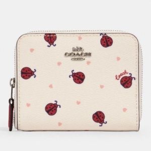 Coach Cream Wallet with Red Ladybug Print